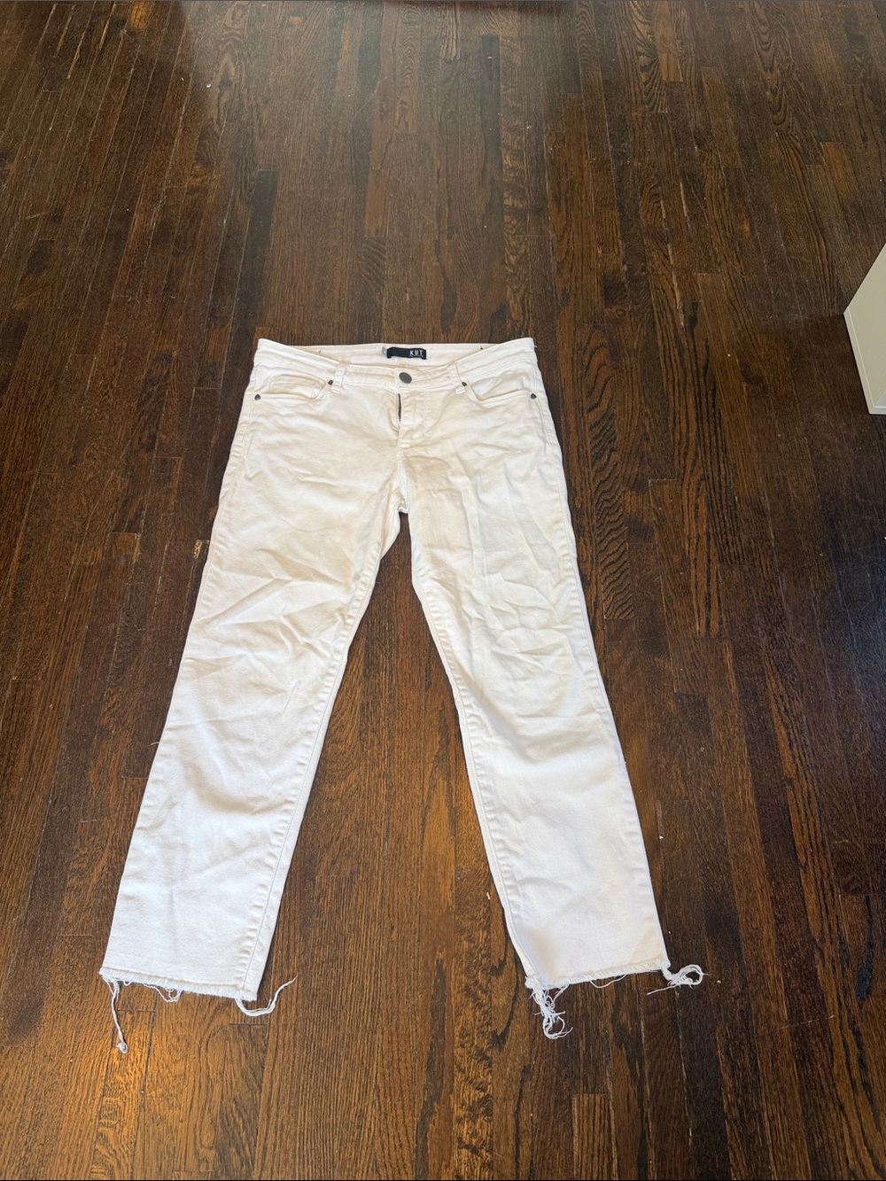 Kut from the Kloth women’s White Straight Jeans with Frayed Hem